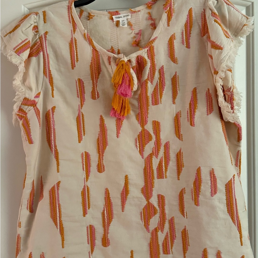 Chic Embroidered Blouse with Tassel Accents